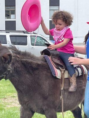 Birthday girl on Pearl the pony