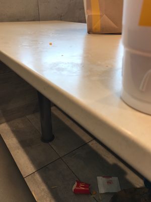 My sweet tea in the foreground but the rest was there in I got here cleanest table I could find -10/10 would not recommend this McDonald's