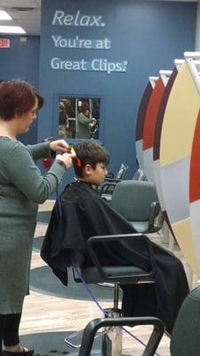 Barrett getting his Thanksgiving haircut.