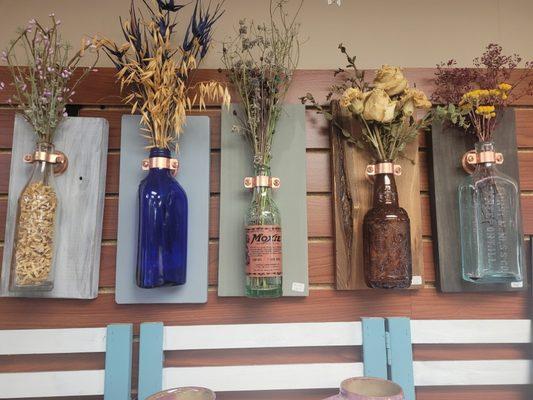 Beautiful upcycled glass bottles 
With dry flowers