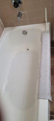 Bathtub and tiles coming apart.