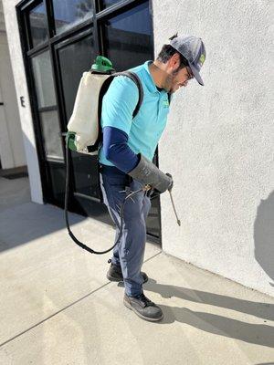 Our technician spraying the foundation of a home.