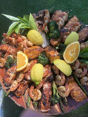 Grilled salmon and shrimp pleats for party of 12-15 p.