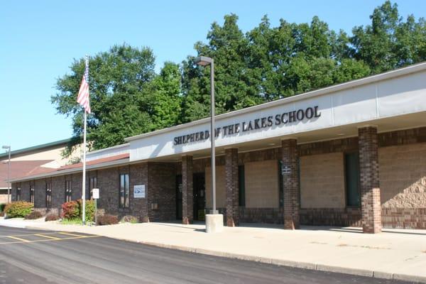 Our school is more than a building, but here's a picture of our school entrance.