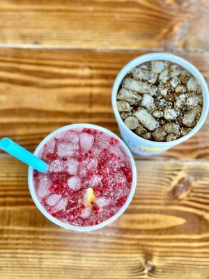 The R&R (water, rasp purée, fresh lemon and lime) with added fresh raspberries, and The Quencher (DP + Coconut)