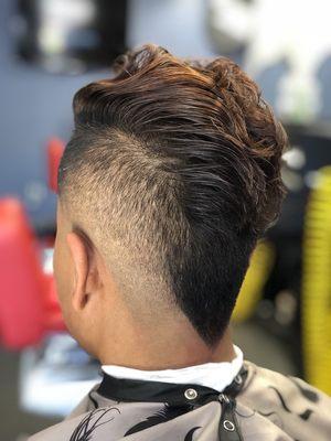 Stylish faux hawk with a skin fade done by @fade_queen