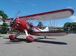 The open cockpit plane is stunning.