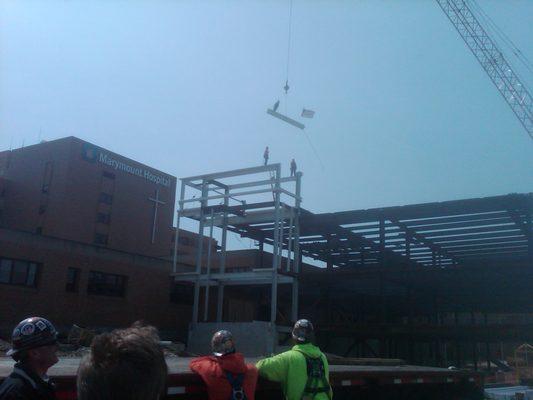 The crew looks on as steel goes up at a Cleveland area surgical center.