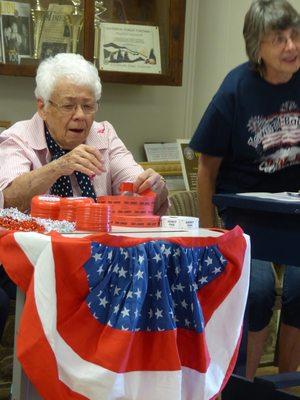 A resident volunteering for the 4th of July Celebration!