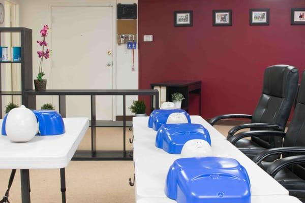 Classroom and CPR equipment setup for learning CPR & First Aid!