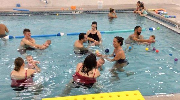 Parents teaching their Babies as they all get comfortable in water! Baby classes are filling up quickly