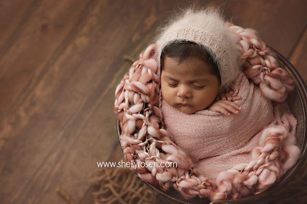 Cozy baby girl in a bucket, one of my favorite poses and props.