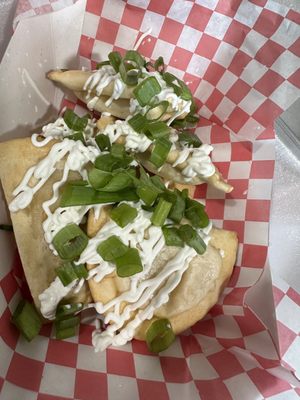 Pierogies with sour cream and And green onions. Yum!!!