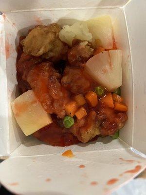 Sweet and Sour Chicken...horrible, soggy mess with frozen peas and carrots and awful neon red jelly...GROSS!