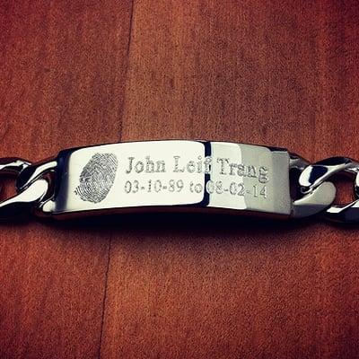 Custom engraved memorial sterling silver ID bracelet with a fingerprint taken from a emailed photograph and accompanying text.