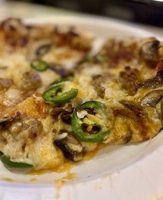 Mushroom, jalapeño, sausage pizza