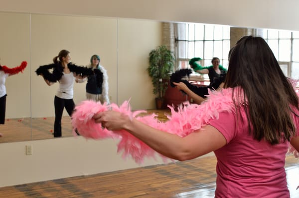 Props such such as canes, chairs, feather boas, and all different style hats, incorporated into the dances.