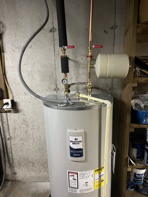 Thermostatic mixing valve and tank mixer to increase supply of hot water out of standard 50 gallon water heater