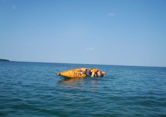 KC (or Casey) demonstrating recovery from capsizing a kayak