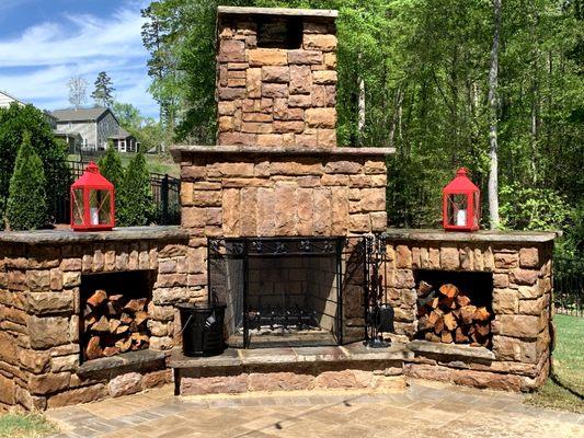 Custom built stone outdoor fireplace