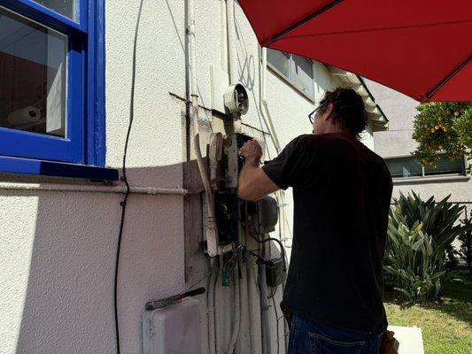 This is my old electrical panel being replaced by Shane the owner