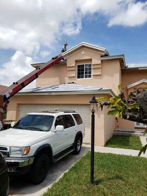 Some of workers evaluating this roof