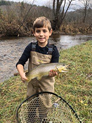 grandson with nice brown trout