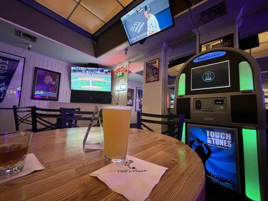 Plenty of seating, tv's with the game, and even a jukebox