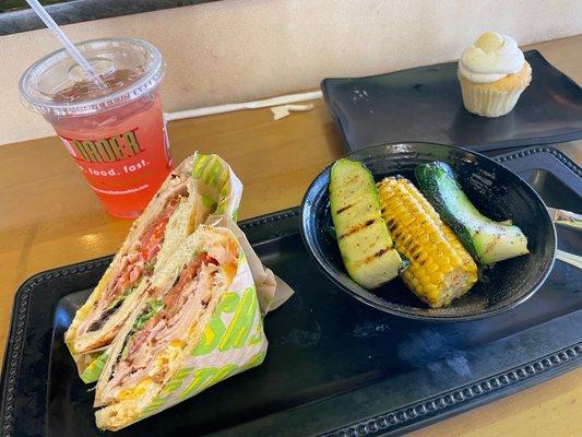 House Turkey Club Panini, Grilled Vegetables, raspberry mojito lemonade, and Vanilla Cupcake of the Day