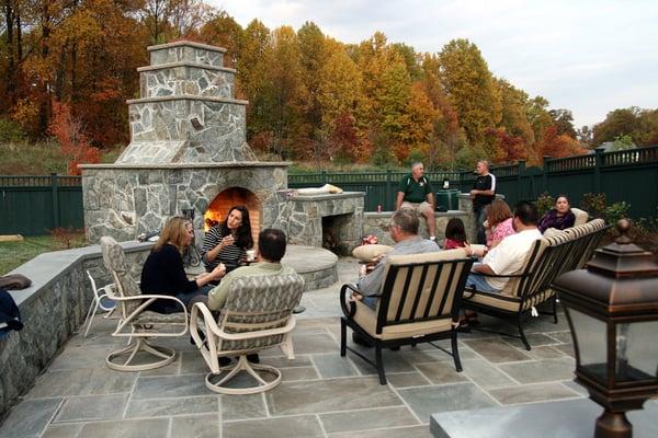 Enjoy your outdoor living space with a new patio and fireplace!