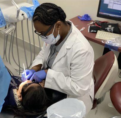 Dr. Reese working with a patient