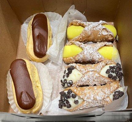 Eclair, classic cannoli and lemon cannoli