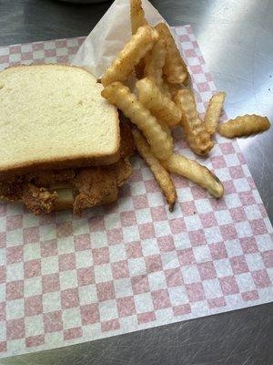 Pork chop sandwich W/Fries