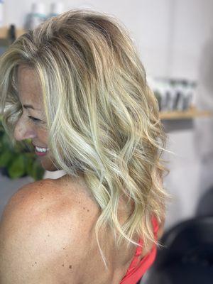 Highlights with wet ombré to brighten up the ends .