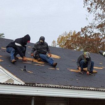 hand nailing shingles