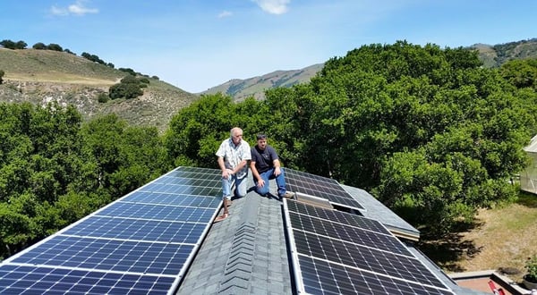 My son, Ben, and I after completing a large system for another happy customer in Corral de Tierra.