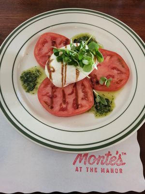 Burrata & tomato with pesto. Delicious