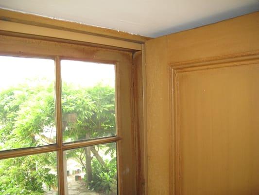 Close-up of a soundproofing, energy-saving acrylic window cover when installed.