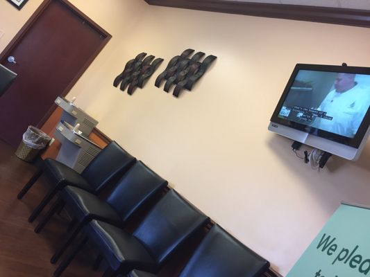 Seating area, water fountain & tv.