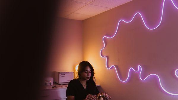 One of our estheticians in our facial rooms. one of four.