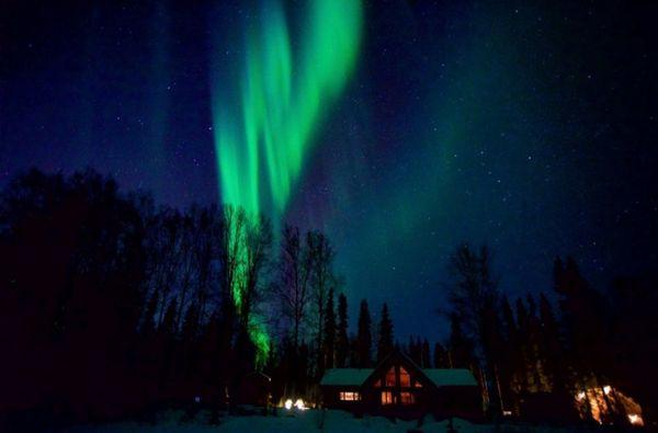 Aurora over Riverbend Cabins