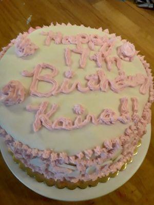 This is a circle cake I made with pink frosting or icing