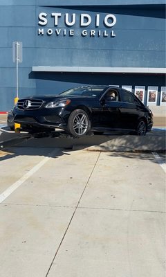 Lifted up Mercedes-Benz e-350 stuck on the curb!