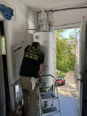 Installation of a new 50 gallon gas water heater underway in Santa Rosa.