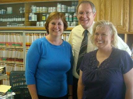 Dr. Mayo and his office staff. You'll always receive a warm welcome and a smail.