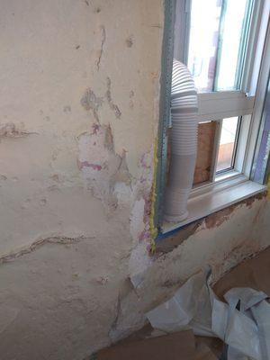 A Peeling Wall With New Windows....Simple.