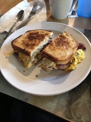 We LOVE the Annabelle breakfast sandwich- egg, cheese, bacon, ham, sausage on toasted sourdough bread