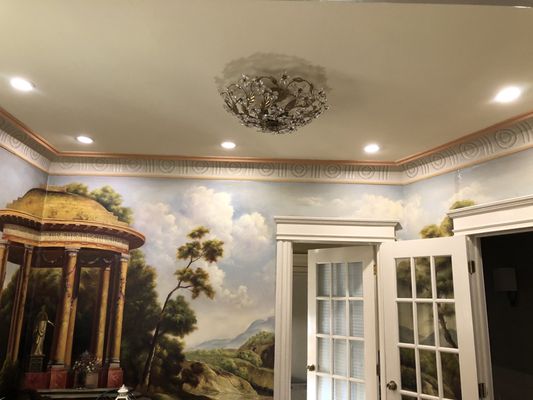 Francisco installed these ceiling lights to highlight the wall mural. Looks like they've always been there!