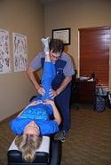 Dr. St.Onge is providing a PNF stretch to his patient.  We utilize a number of different stretches to help you get better.