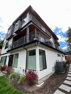 A new home's makeover in Kirkland, WA. Our residential exterior painting and staining project adds modern allure to this residence.